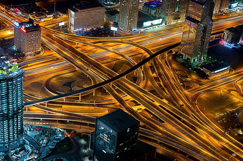 Aerial view of a busy city highway at dusk