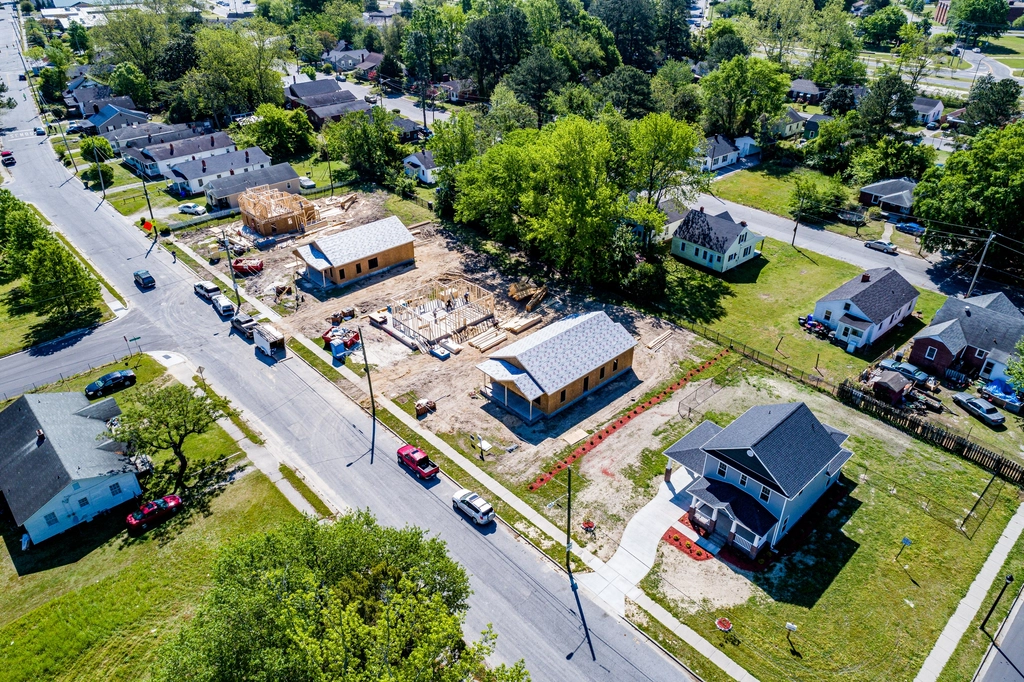Aerial view of suburban homes representing mortgage assets